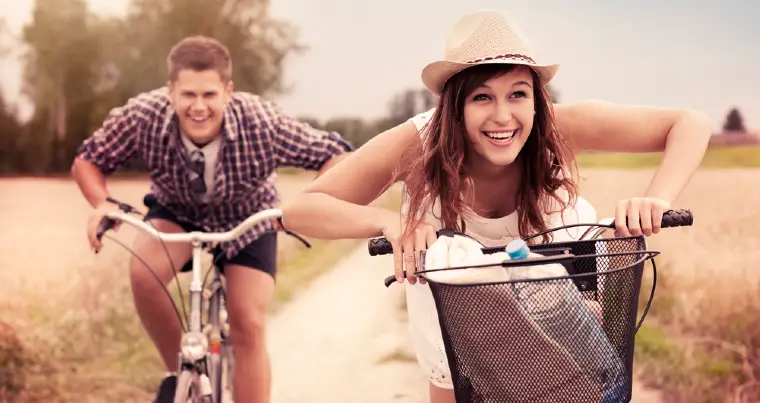 Couple Having Fun On Schwinn Bicycles
