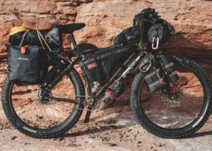 mountain bike with backpacks for bikerafting