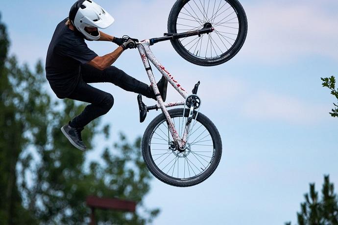 cyclist riding one of the other types of mountain bike leaping