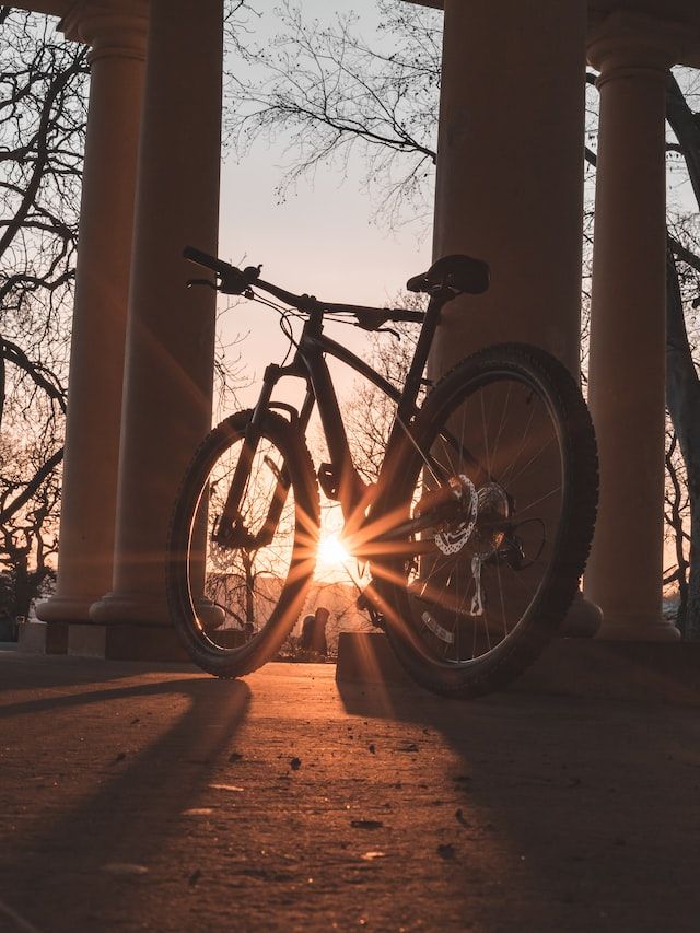 Bike parked and a sunset view
