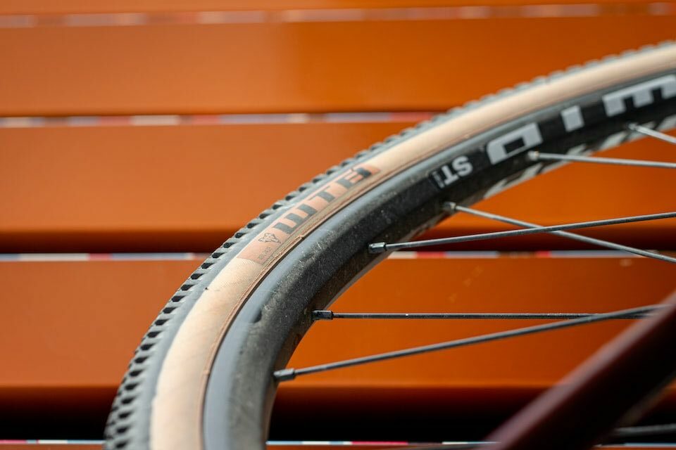WTB Riddler bike wheels in front of a orange wall